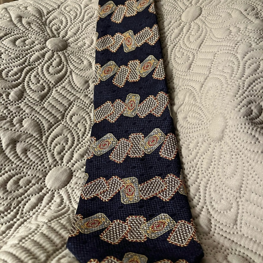 Metropolitan Museum of Art silk tie.  Dark blue w/ gold, red, blue card squares